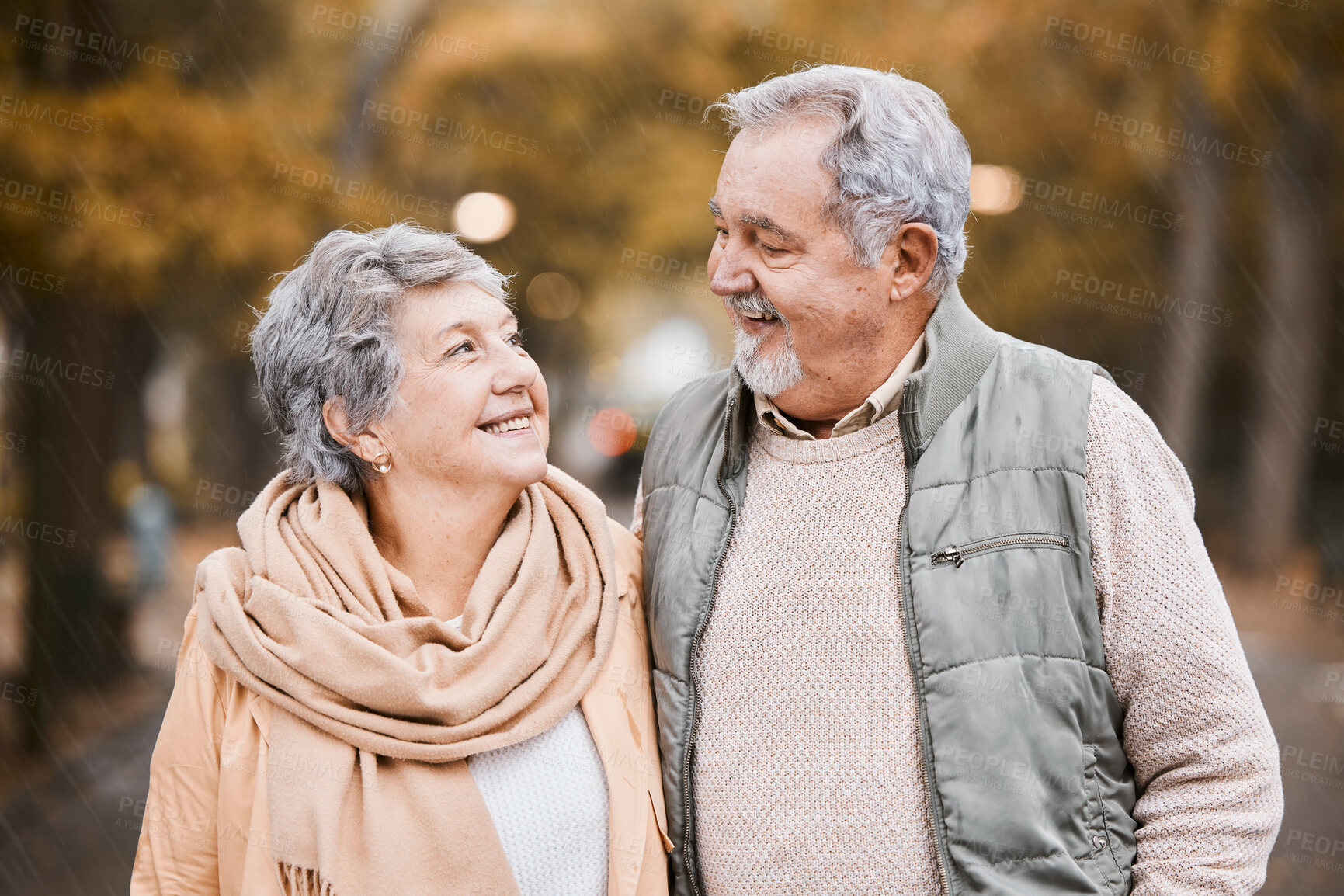 Buy stock photo Senior couple, love and health while walking outdoor for exercise, happiness and care at a park in nature for wellness. Old man and woman together in a healthy marriage during retirement with freedom