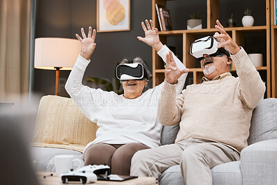 Buy stock photo Gaming, virtual reality and senior couple with headset play online game with VR, technology and smile. Future, elderly woman and happy man in home watching futuristic augmented reality video on sofa.