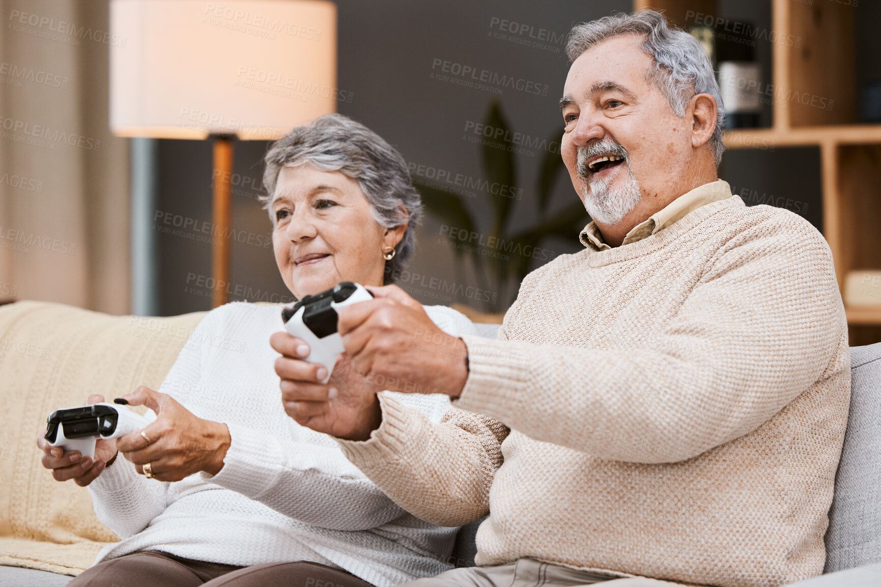 Buy stock photo Video game, sofa and senior couple with gaming online in home for happy holiday, retirement and lifestyle together with technology. Excited, elderly and gamer people on couch on games in living room