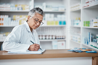 Buy stock photo Pharmacy, woman and checklist on clipboard, paperwork and inventory management in wellness store. Mature female pharmacist writing notes for stocks manager, medicine product or retail health services