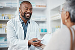 Pharmacy, medicine and pharmacist in discussion with a patient explaining her prescription. Healthcare, medical and African male chemist speaking to a woman at a pharmaceutical clinic or drug store.