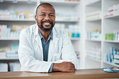 Buy stock photo Medicine, healthcare and portrait of black man at pharmacy for trust, insurance and prescription. Wellness. medication and male pharmacist with pills, vitamins and tablets in hospital dispensary