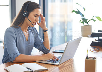 Buy stock photo Call center, stress and tired woman working on laptop with headache, burnout and depression consulting at CRM desk. Female with anxiety mental health problem at customer service telemarketing office