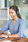 Telemarketing, call center and woman typing on laptop for technical support, crm consulting and help desk communication. Contact us, email and happy customer service worker with pc for online service
