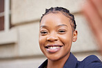 Black woman, business face and smile for a selfie while online for a social media update on leadership status or profile. Portrait of African entrepreneur outdoor happy about career choice and future