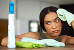 Spring cleaning, woman and sad thinking in home unhappy, bored and tired of housework service. Beautiful latino girl maid thoughtful cleaning house with frustrated, stressed and depressed face. 