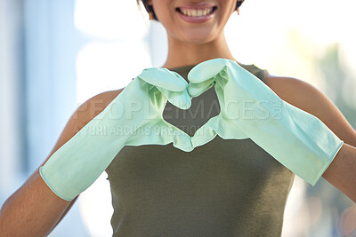 Buy stock photo Cleaner with heart hand, love cleaning with woman, housekeeping with gloves for safety, disinfection and health. Emoji, clean and housekeeper with domestic service, wellness and happy person