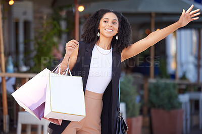 Buy stock photo Black woman, shopping and city street as happy customer waves hand for cab or taxi on urban street with retail bags. Travel, fashion and smile of female while waiting for transport outdoor in France