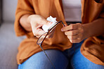 Woman cleaning glasses for dust, dirt and eye care protection with fabric tissue. Closeup female hands, microfiber cloth and spectacles, frames and eyewear for clear vision and optic lens maintenance