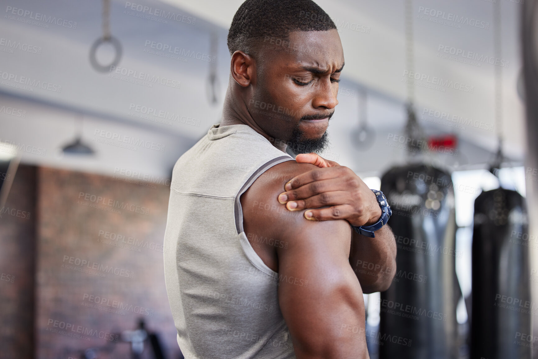 Buy stock photo Exercise, black man and shoulder pain for training, fitness and workout for wellness in gym. Nigerian male, athlete and body care with pain, tired and injury for ache, strong and orthopedic problem