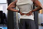 Black man, fitness or back pain in gym workout, exercise or training and body anatomy crisis, muscle burnout or spinal tension. Sports athlete, personal trainer or coach with injury or health problem