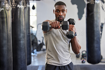 Portrait, dumbbell and fitness with a black man bodybuilder in a gym for a workout or exercise. Health, training or weightlifting with a male athlete or personal trainer exercising in a sports center