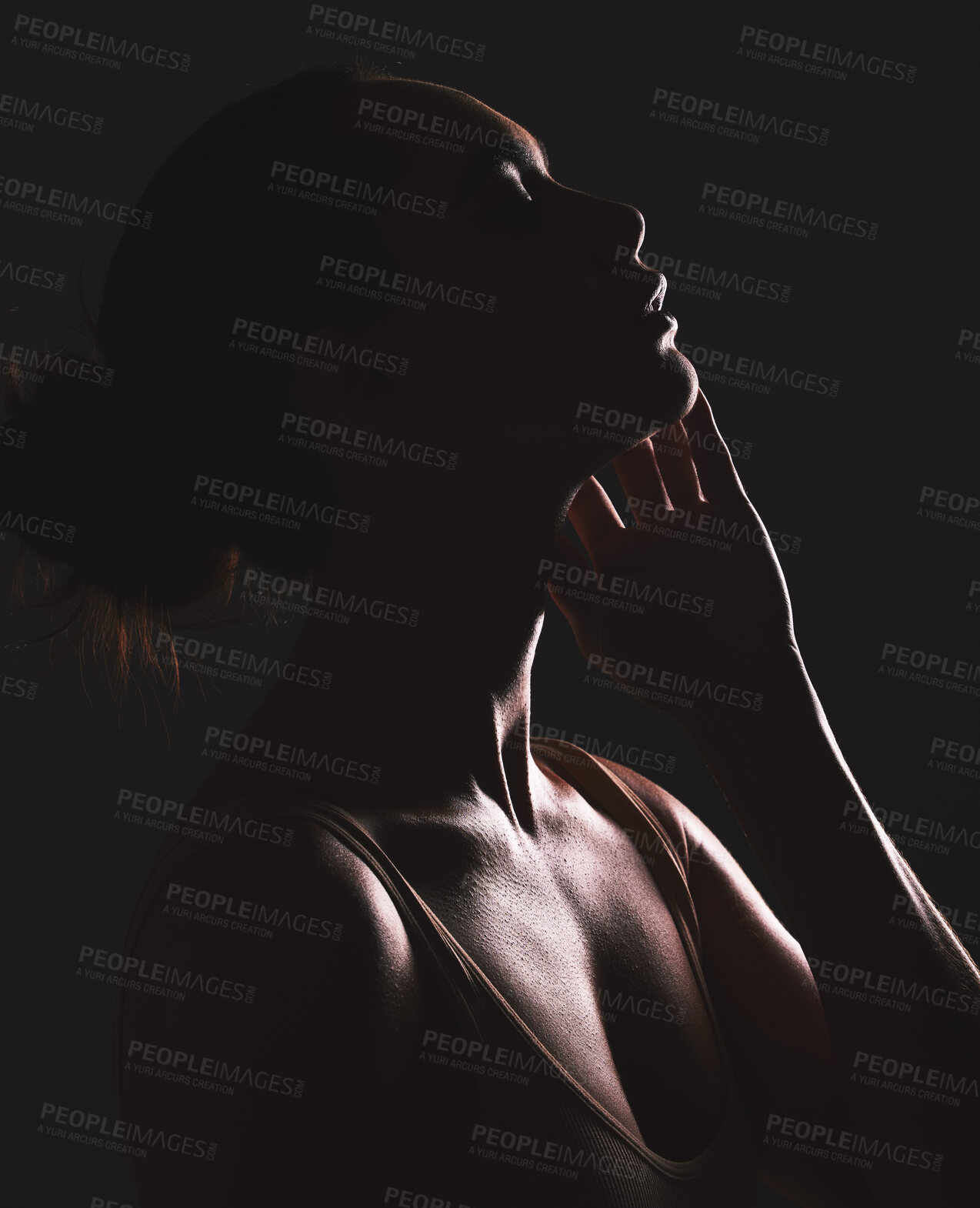 Buy stock photo Woman beauty silhouette, face and dark, sexy with cosmetics and seductive fantasy with mysterious aesthetic. Female profile with skin, sexy woman facial and shadow against black studio background.