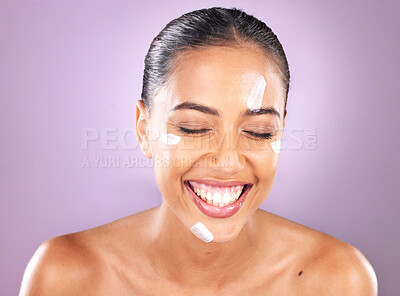 Buy stock photo Woman face, skincare and beauty cream for dermatology, health and wellness of natural glow skin on purple background. Headshot of happy cosmetic model laughing in studio with sunscreen product