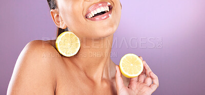 Buy stock photo Woman, face skincare or lemon product on purple studio background for organic dermatology, healthcare diet wellness or self care grooming. Zoom, smile or happy beauty model and fruit facial cosmetics