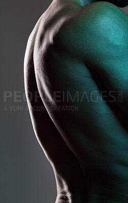 Buy stock photo Man, body or muscles on dark studio background and blue light aesthetic, fitness goals or workout progress. Zoom, back skin or bodybuilder model and exercise, training or healthcare wellness strength