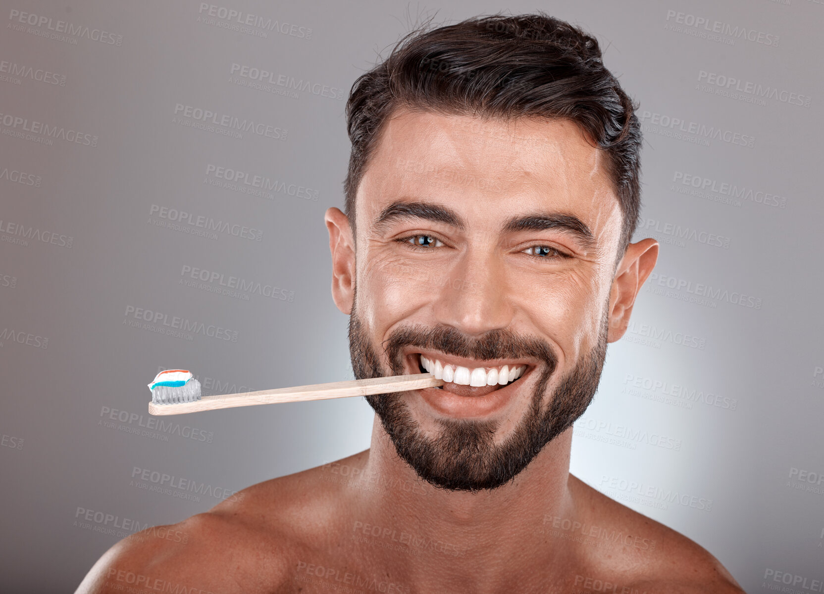 Buy stock photo Portrait, man and toothbrush with smile, wellness and on grey studio background. Dental hygiene, male or mouth health with toothpaste,  fresh breath or brushing teeth for oral cleaning or healthcare
