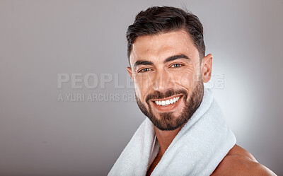 Buy stock photo Man with towel, beauty and face with skincare, hygiene and self care portrait against studio background. Grooming, skin and glow with cosmetic mockup, facial wellness and clean teeth with smile