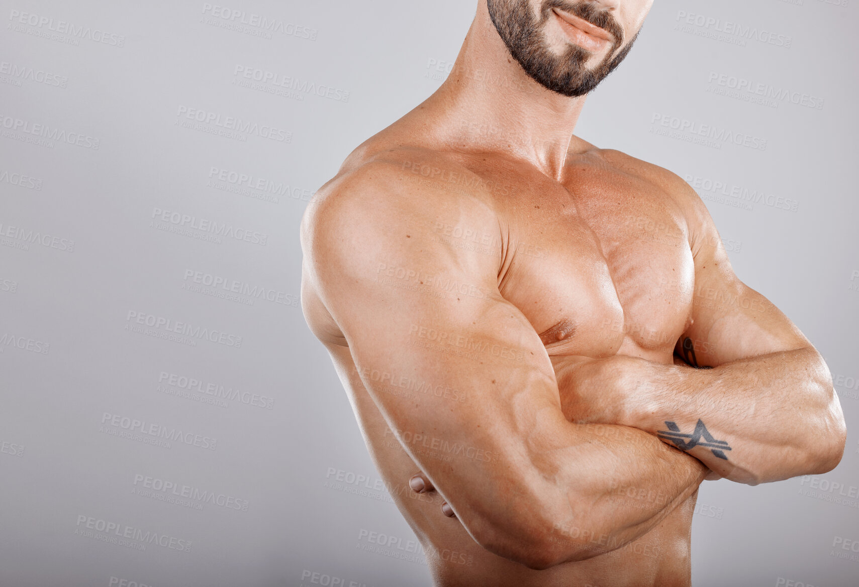 Buy stock photo Muscles, man and arms crossed for healthy lifestyle, bodybuilding and on grey studio background. Exercise, male athlete and bodybuilder with wellness, chest and fitness for body care, diet and energy
