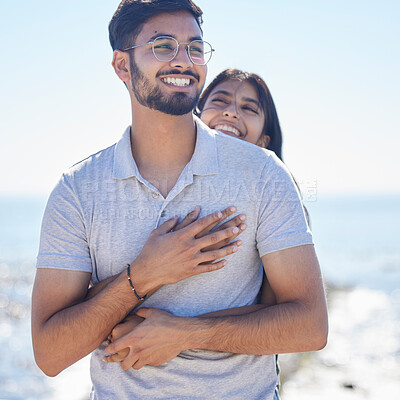 Buy stock photo Hug, happy young couple at beach with travel and care on summer holiday by ocean, commitment and support outdoor. Partner, embrace and relationship with romantic date, man and woman on vacation