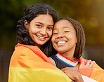 Lesbian, couple and women hug, lgbtq relationship with smile together and commitment with flag and pride in portrait. Happy, equality in sexuality and freedom to love, lgbt community and diversity