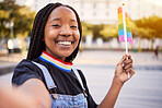 Black gay woman, selfie and rainbow flag for lgbtq pride with a smile for sexuality freedom, non binary and gender neutral lifestyle. Portrait of young lesbian girl in the city for equality and love
