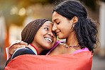 Love, hug and happy lesbian couple at a freedom, equality or LGBTQ festival, event or parade. Happiness, smile and gen z interracial gay women embracing, hugging and bonding together in the city.
