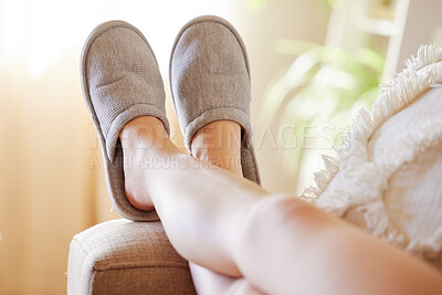 Buy stock photo Legs, relax and woman in slippers on sofa resting on weekend at home. Shoes, freedom and female relaxing, lying and spending time alone on comfy, cozy and comfortable couch in living room of house.