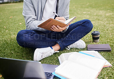 Buy stock photo Study, laptop and student in park writing at university, college or campus for education research, planning schedule or scholarship. Relax person on grass learning on technology and notebook for exam