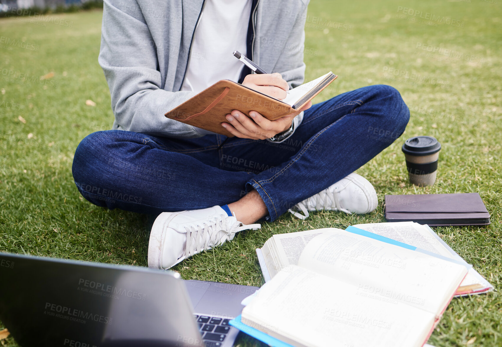 Buy stock photo Study, laptop and student in park writing at university, college or campus for education research, planning schedule or scholarship. Relax person on grass learning on technology and notebook for exam