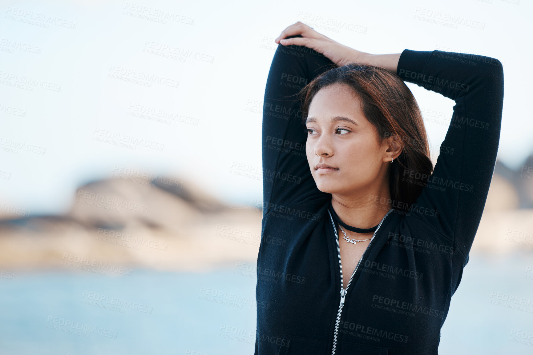 Buy stock photo Woman stretching with fitness, running at beach for exercise and body training outdoor mockup. Young runner, warm up and start run with cardio, wellness and health by ocean for workout lifestyle.