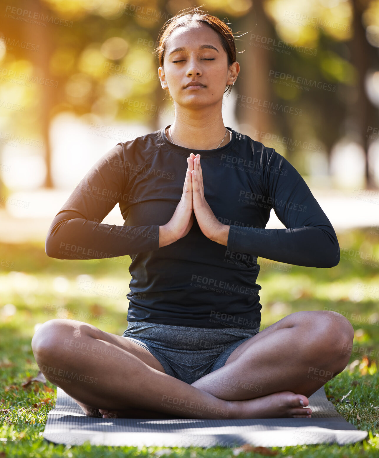 Buy stock photo Relax woman, namaste and meditation at park, wellness or freedom of chakra energy, zen fitness or peace. Young girl, yoga exercise and lotus praying in nature with eyes closed, mental health and calm