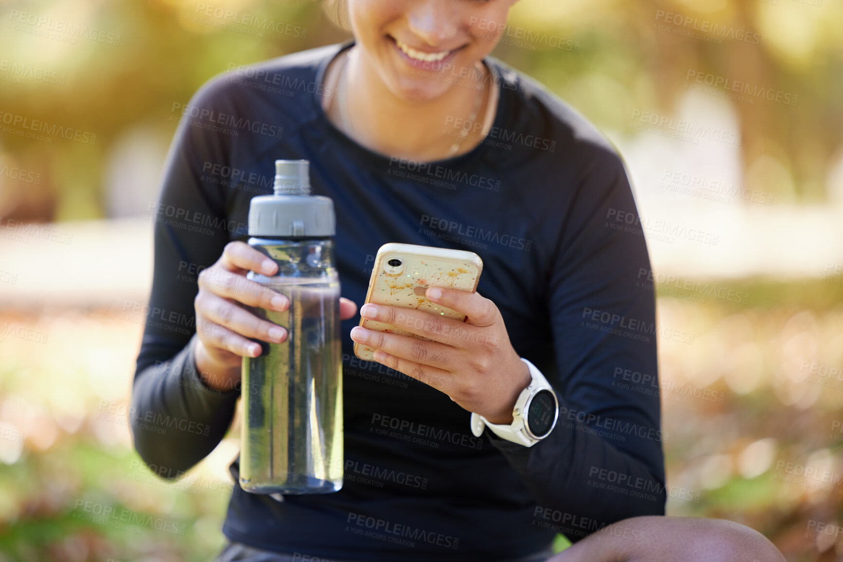 Buy stock photo Water bottle, smartphone and woman in park for fitness  website app, blog or social media exercise, workout or training update. Healthy, nutrition and cellphone technology or gear of runner in nature