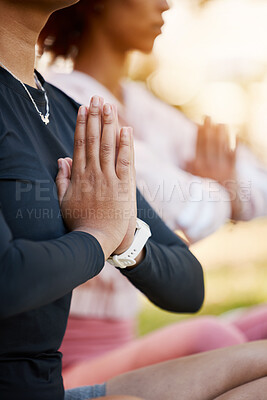 Buy stock photo Women, namaste hands and yoga meditation at park, wellness and freedom of chakra energy, zen fitness or peace. Closeup of calm friends, relax exercise and meditate in nature for mental health balance