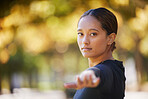 Yoga, fitness and woman in nature for peace, workout freedom and exercise in New Zealand. Pilates, stretching and woman with park pilates for morning health, energy and balance with warrior pose