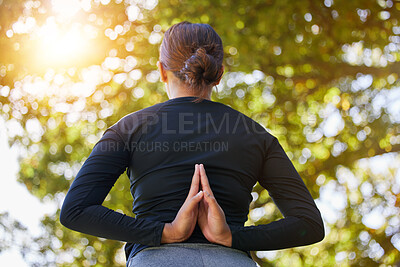 Buy stock photo Yoga, prayer hands and back of woman at park for health, wellness and flexibility. Zen chakra, pilates and female meditating, stretching and training outdoors alone in nature for workout or exercise.