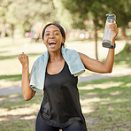 Fitness, excited and portrait of a black woman in nature for celebration, wellness or exercise. Happy, smile and healthy African female athlete celebrating her workout, training or sport achievement.