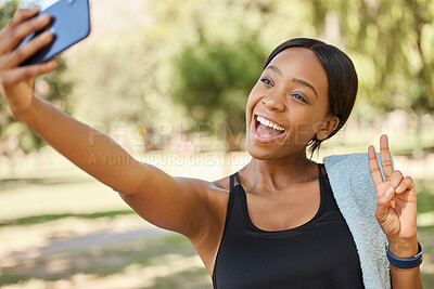 Buy stock photo Selfie, peace and park with a sports black woman taking a photograph outdoor during fitness or exercise. Social media, towel and nature with a female athlete posing for a picture while training