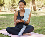 Phone, yoga or black woman on social media for fitness  training, exercise or nature park workout content. Typing, social network or healthy girl with a funny, peaceful or happy smile in Nigeria