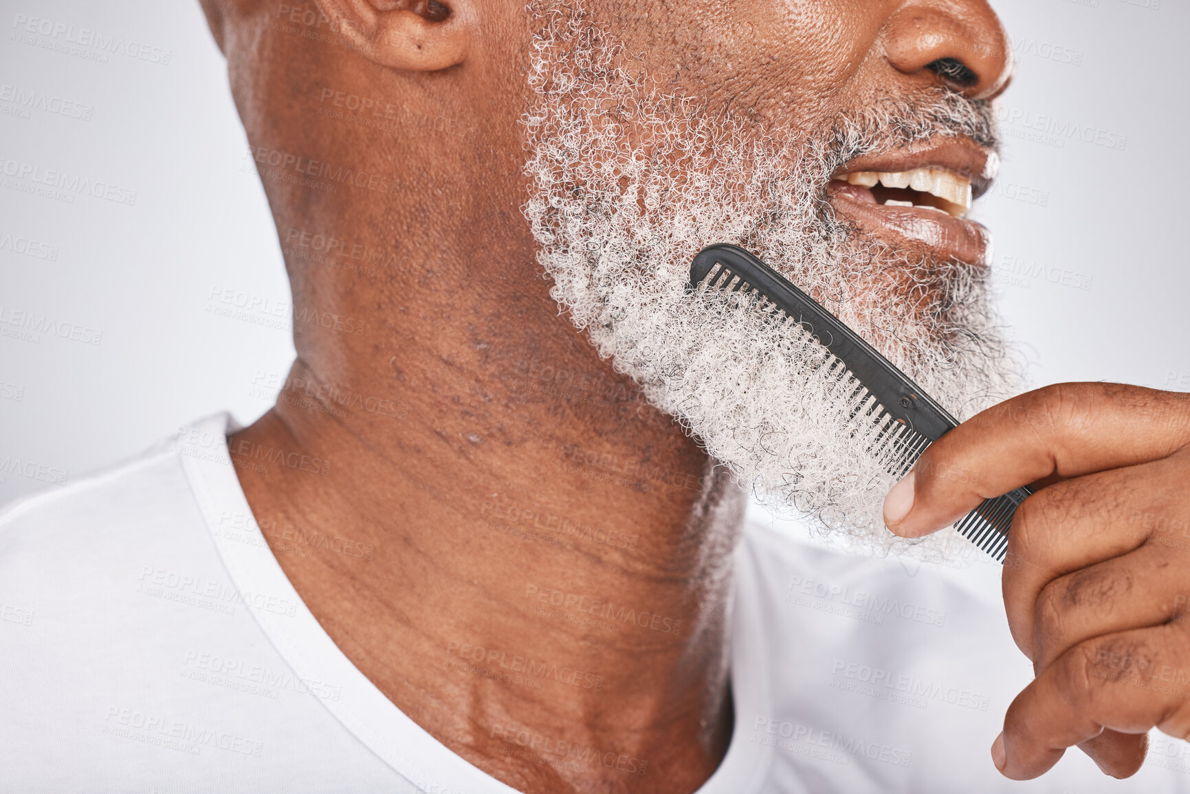 Buy stock photo Elderly, black man and comb for beard, beauty and grooming with hygiene and cleaning face zoom. Hair care, brush body hair and wellness with cosmetic care and natural against studio background