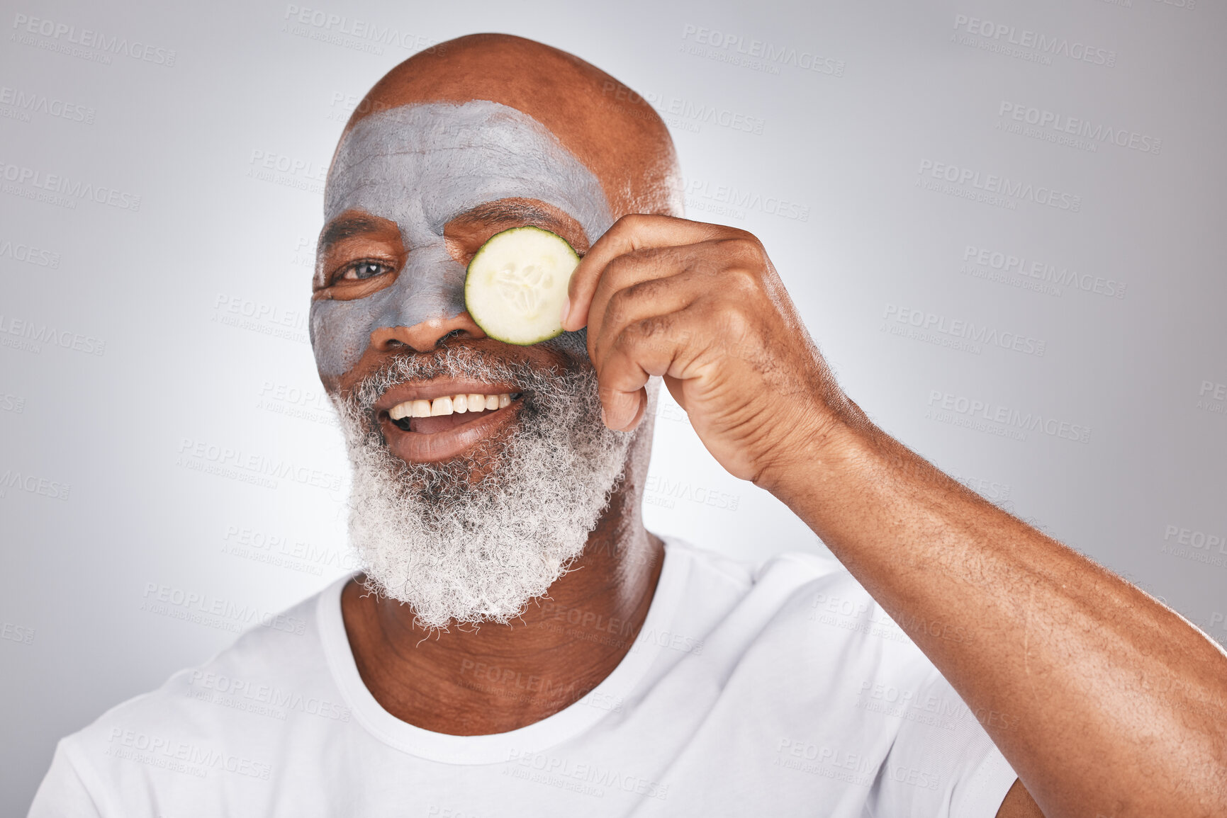 Buy stock photo Skincare, face mask or happy old man with cucumber marketing or advertising natural vegan diet for glowing skin. Cream, portrait, senior black man with beauty or healthy anti aging facial cosmetics