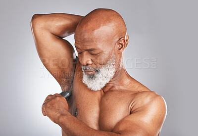 Buy stock photo Product, armpit or senior black man with deodorant for healthy body hygiene in grooming morning routine. Studio mockup, self care or old man with underarm roll on for wellness, skincare or self love