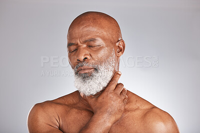 Buy stock photo Senior black man, massage pain in spa on gray background or physical therapy care for healthy body. Elderly african person holding muscle, stress of burnout and medical wellness in retirement support