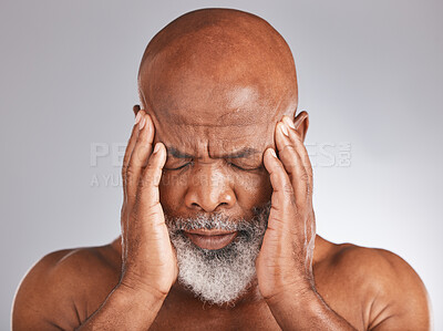 Buy stock photo Elderly black man, headache and pain with hands and face, stress and mental health against studio background. Depression, skin and senior with healthcare problem, retirement and anxiety migraine