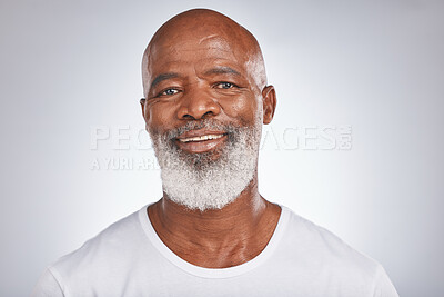 Buy stock photo Senior black man, face and self care with skincare, dermatology and cosmetics for clean, glow and fresh skin. Headshot of African male with a beard on grey studio background for beauty spa treatment