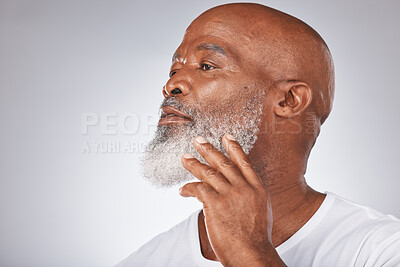 Buy stock photo Senior black man, face and self care with skincare, dermatology and cosmetics for clean and fresh skin. Headshot of African male on grey studio background for beauty and beard hygiene and grooming