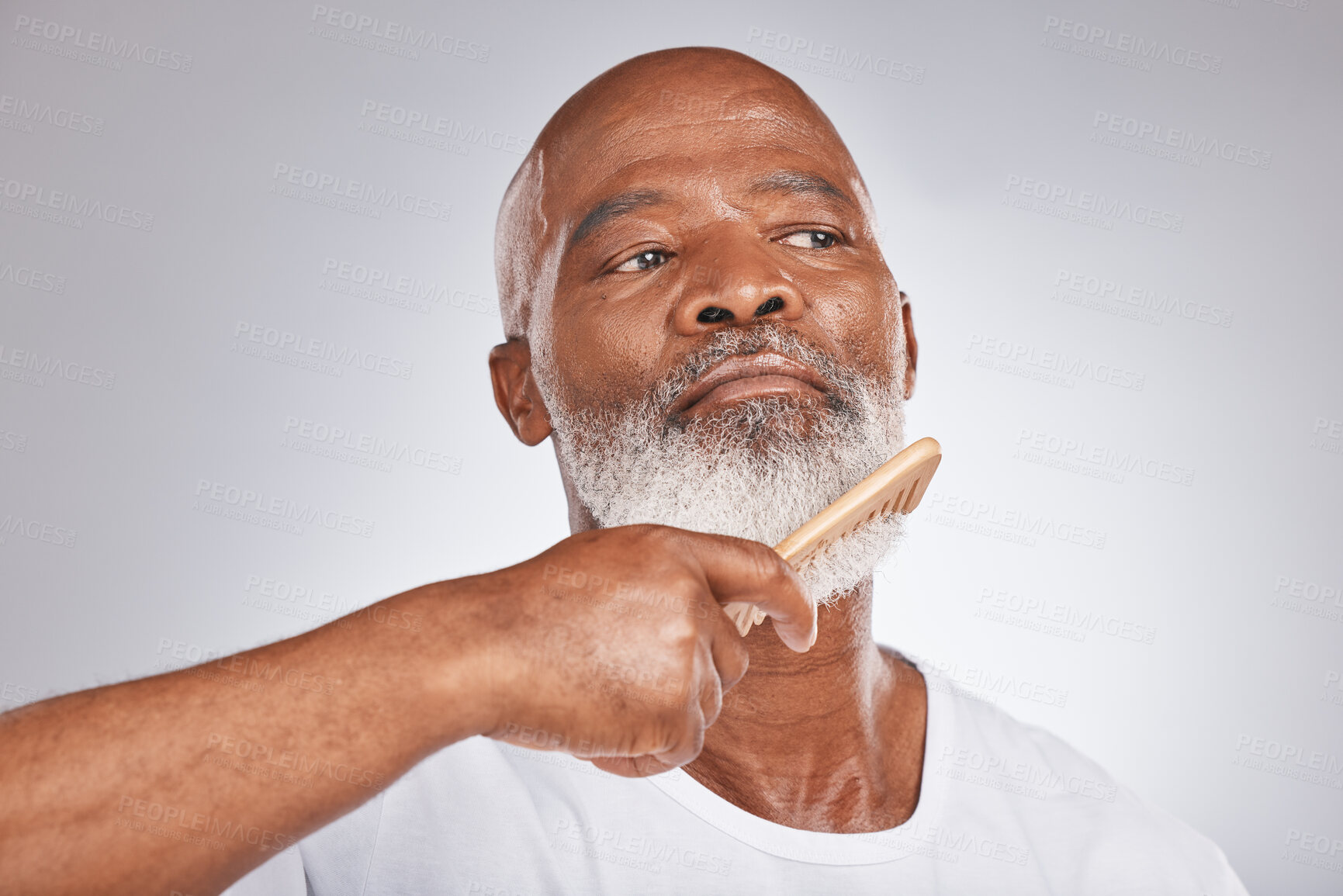 Buy stock photo Elderly, black man with comb for beard, beauty and grooming with hygiene and cosmetic care against studio background. Hair care mockup, brush body hair and face with hair treatment and cosmetics