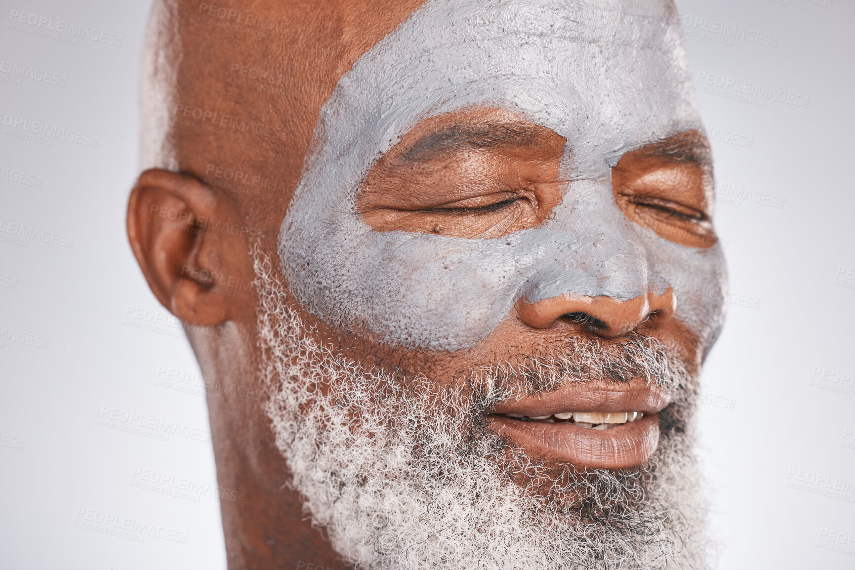 Buy stock photo Skincare, face mask or old man with facial cream marketing or advertising a luxury beauty product for self care. Studio background, cosmetics or senior black man with a happy smile, glow or self love