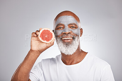 Buy stock photo Grapefruit, face mask and portrait of man, healthy skincare and beauty, wellness and makeup of anti aging, detox or natural facial cleaning. Happy face, studio male model and vitamin c fruits of glow