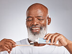 Dental, toothbrush and product with face of black man for oral hygiene, teeth cleaning and self care. Beauty, cosmetics and grooming with senior model and toothpaste for brushing teeth and health